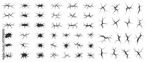 Various black ground crack graphic elements for design on white background