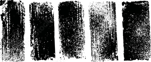 Set of five black ink brush strokes with textured grunge appearance on white background