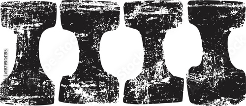 four vintage cast iron dumbbells in a row with worn, textured surfaces and rustic appearance