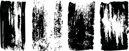 set of four black grunge brush strokes with distressed textured effect on transparent background