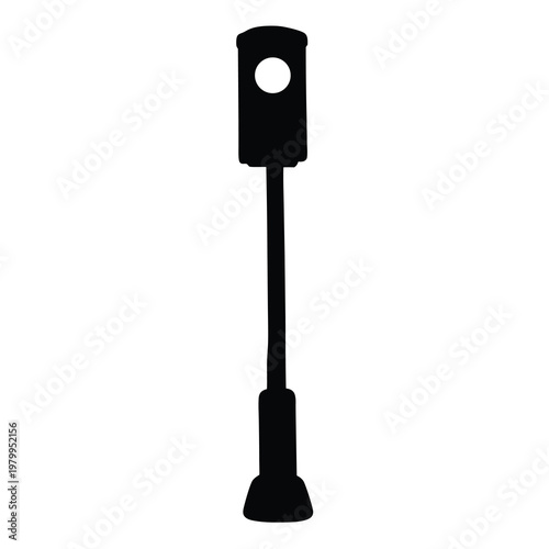 Silhouette of a modern stylized streetlight with a circular opening for light