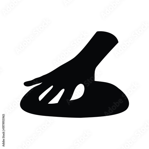 Monochrome image of a hand pressing or touching a round object silhouette