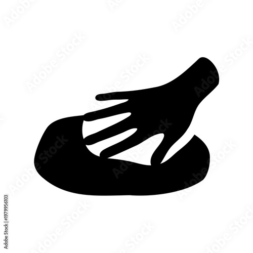 Black silhouette image of a hand manipulating a rounded object or dough
