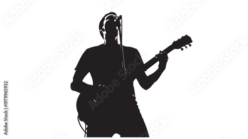 Silhouette of guitar player performing on stage