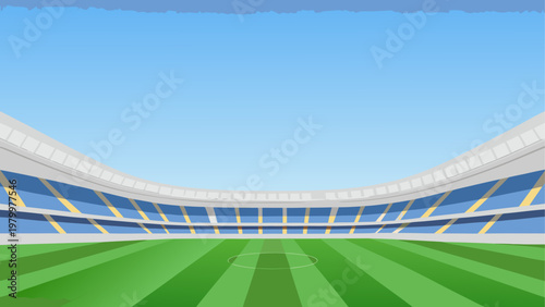 A spacious stadium with green field and empty spectator stands under clear sky