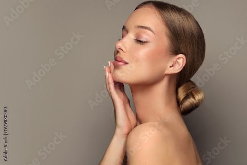 Beautiful Young Woman with Clean Fresh Skin . Facial treatment . Cosmetology , beauty and spa . Skin care
