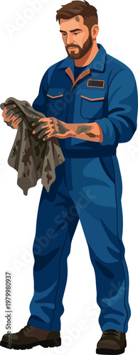 Mechanic wiping greasy hands with a rag after finishing work