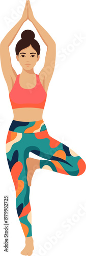 Yoga practitioner balancing in tree pose with hands raised