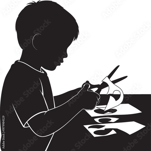 Boy Cutting Paper with Scissors at Table