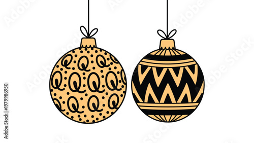 Two decorative christmas ornaments with black and gold patterns hang against a white background for holiday season celebration.