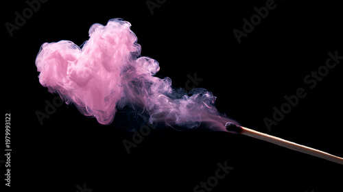 Fotografie A matchstick with pink smoke on a black background, creating a heart shape
