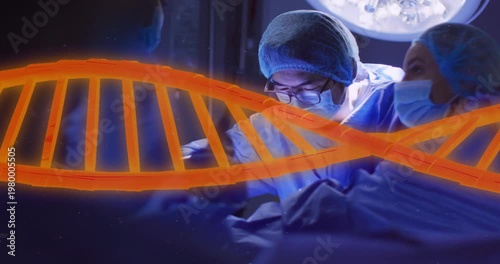 Chinese surgeon making incision under lamp initiating DNA helix animation sweeping for gene data