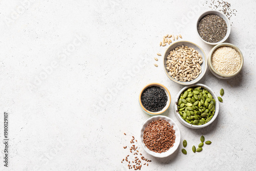 Assortment of seeds in bowls for healthy eating