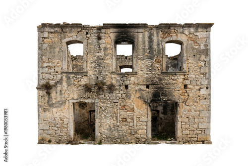 Burned stone building facade ruin isolated. Abandoned house architecture.
