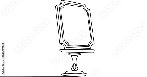 Elegant vintage style vanity mirror standing on a pedestal for home grooming and personal care routines