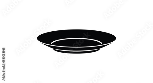 A simple black plate presented on a white background stark silhouette