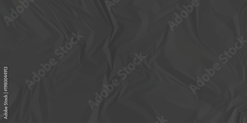 Crumpled paper Blank black crumpled and creased paper poster. Isolated light grungy wrinkled torn old paper material abstract texture background.