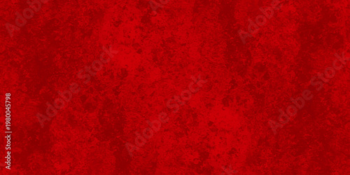 Rich, textured red surface, exuding a sense of depth and intensity. The vibrant hue makes this image ideal for conveying passion, energy, or sophistication.