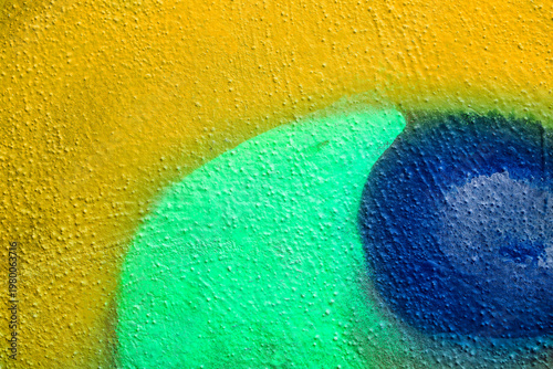 Beautiful bright colorful street graffiti background. Abstract creative spray drawing fashion colors on the walls of the city. Urban Culture gradient texture, copyspace backdrop