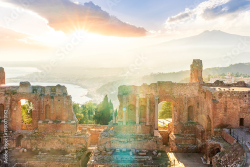 View at town Taormina, old touristic place in Sicily, Italy. Taormina town coastal view.  Sunny old italian town, Mediterranean Coast in Europe