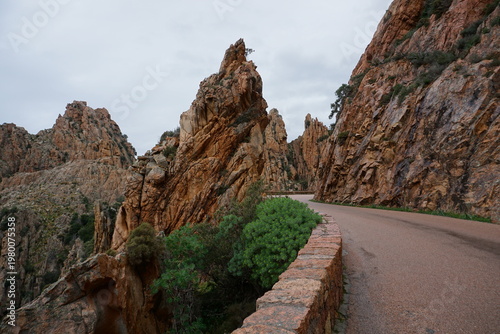 road in the mountains on the island of corsica, france by the red coast