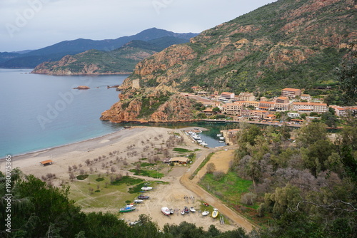 panoramic view of the town of porto on the island of corsica, france with the harbor and beach