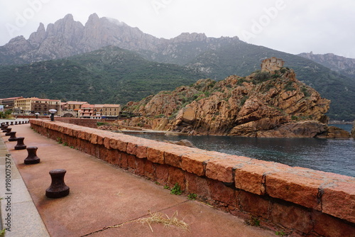 panoramic view of the town of porto on the island of corsica, france with the harbor and beach