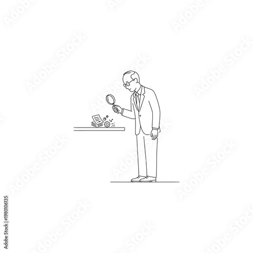 Man in suit examining something closely.