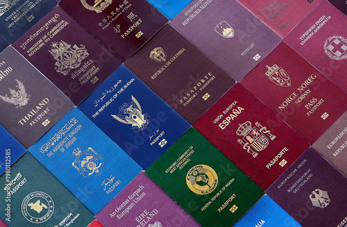 Wallpaper Mural Big amount of passport covers from many biometrical passports close up. Travel concept Torontodigital.ca