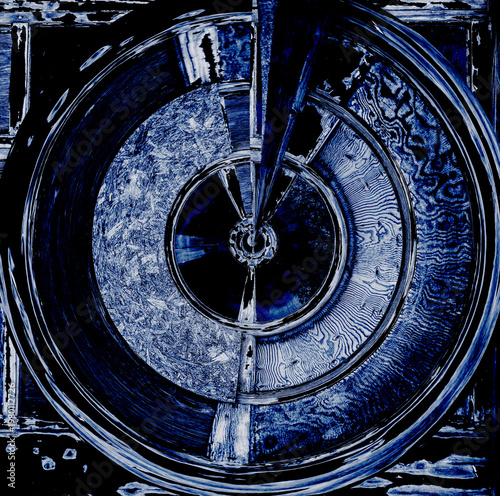 Round shape shows movement & turning, as a wheel, record, earth, world, gears. Abstract idea has a center & broad ridges of color rims that are spinning.