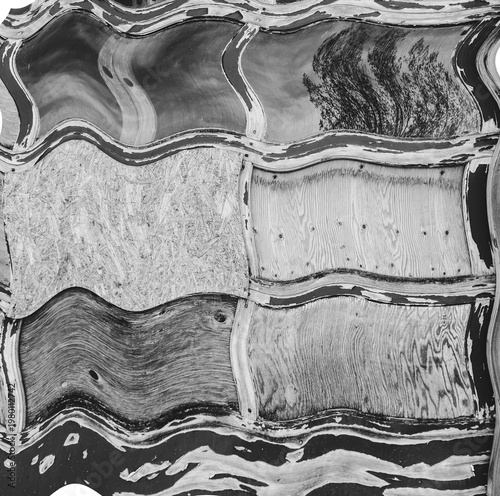 Black & white old wooden paneled garage door with wave photo filter emphasizes falling apart, destruction, world ending, catastrophe. 