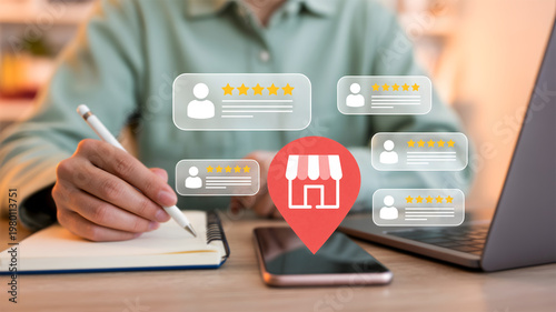 Customer Review and Store Location Rating Concept with Business Owner Working on Laptop and Notebook