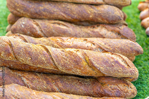 Different types of bread displayed at a street market. Food