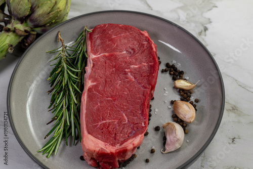 Beef steak with rosemary , salt and pepper