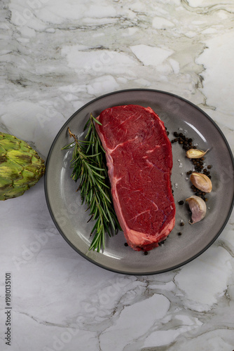Beef steak with rosemary , salt and pepper