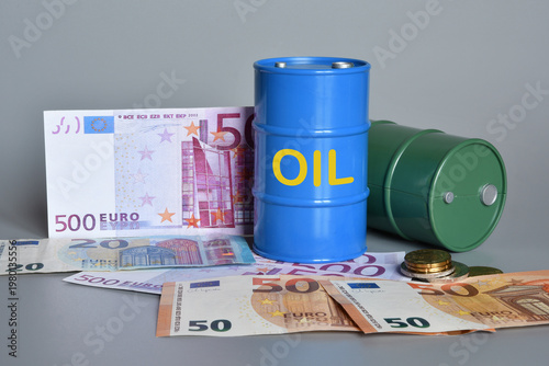 Miniature oil barrels with Euro banknotes . Concept of fuel shortages and rising prices due to the Middle East crisis and the war in Iran.