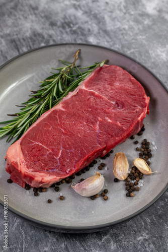 Beef steak with rosemary , salt and pepper