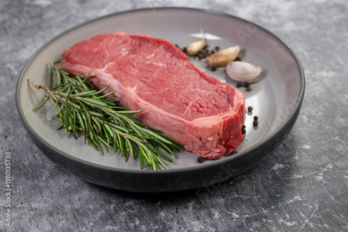 Beef steak with rosemary , salt and pepper