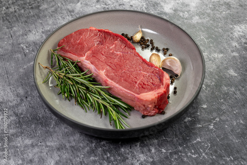 Beef steak with rosemary , salt and pepper