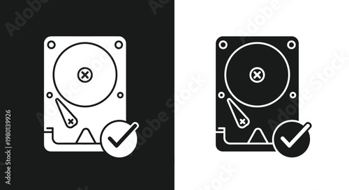 A contrasting depiction of a hard disk drive icon shown in positive and negative forms