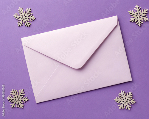 Elegant Pastel Envelope Mockup on Purple Winter Background with Snowflakes
