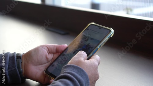 Using Mobile phones in hands looking posts social media chatting call