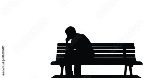 Silhouette of a man sitting on a bench looking sad and thoughtful alone