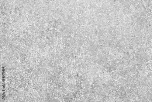 White gray wall with a rough texture. wall is covered in white paint. wall is not very smooth as white textured background web banner template page