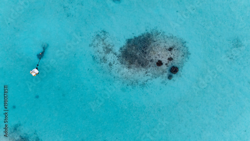 Drone Aerial View of Onok Island, Balabac, Philippines. Tropical Beach, Clear Water, Coral Reefs and Turtles.