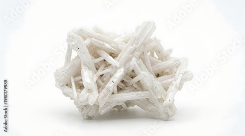Intricate cluster of delicate white mineral crystals showcasing a natural geological formation