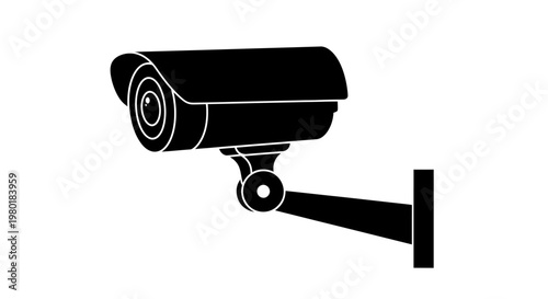 A black security camera mounted on a wall detailed silhouette