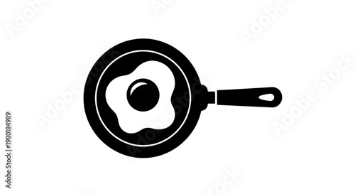 Black frying pan with a fried egg simple graphic silhouette