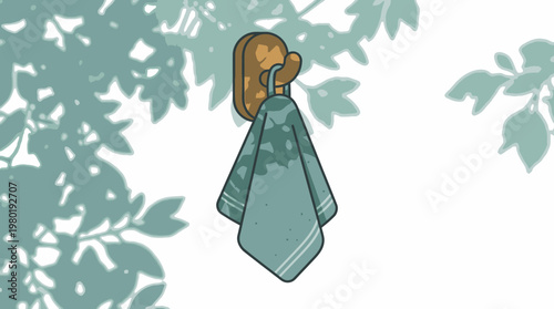 Soft green towel hangs gracefully on a wall hook, dappled with natural leaf shadows, suggesting cleanliness and a serene home environment