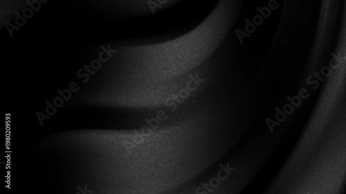 Grainy gradient smooth black fabric texture folds ideal for backgrounds, clothing design, fashion presentations, and minimalist graphic design projects.